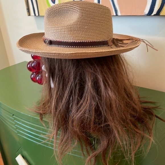 Cowboy hat. It’s tan with a gold shimmer main image 4